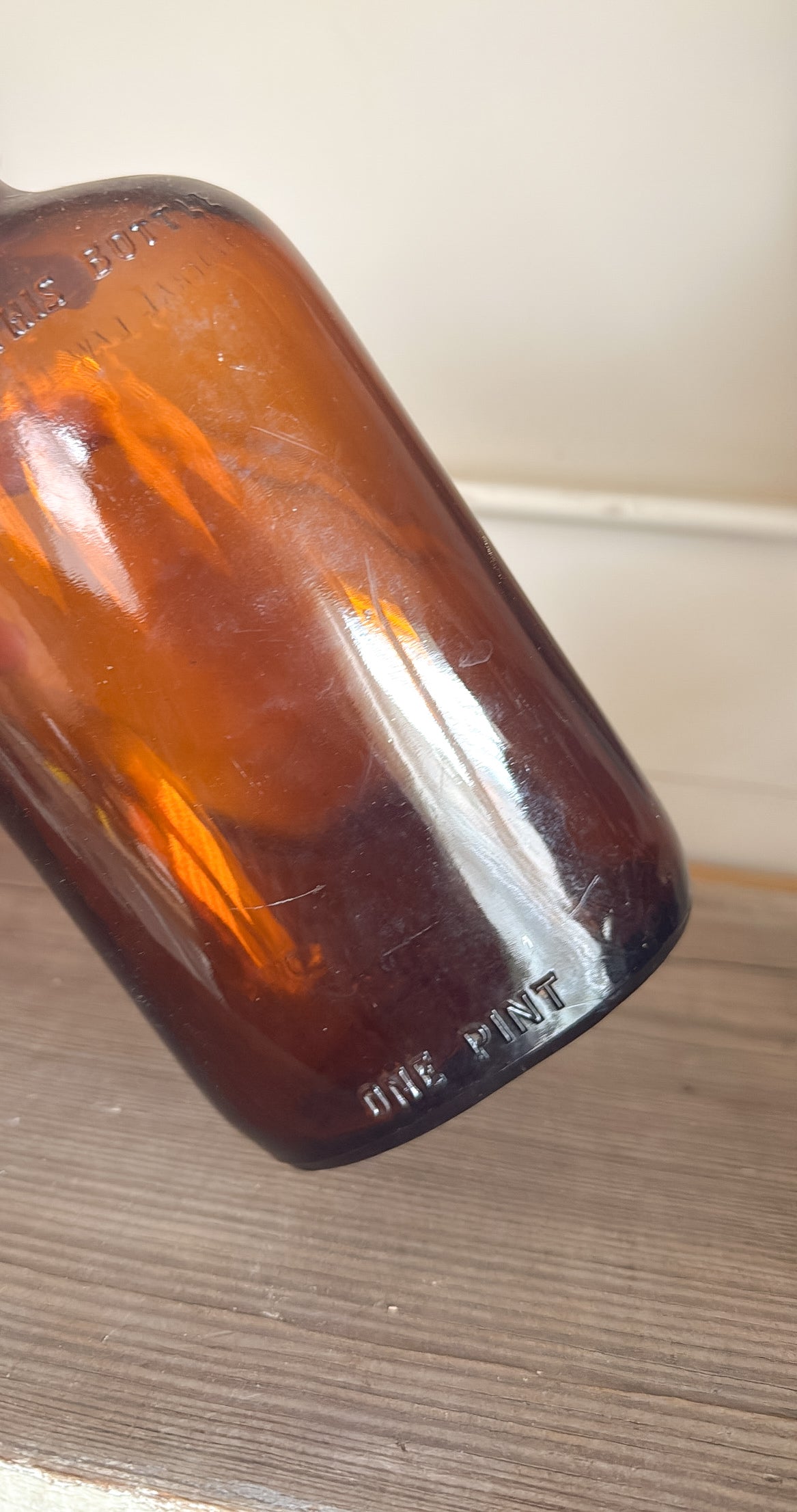 8.5”T Glass Amber Bottle