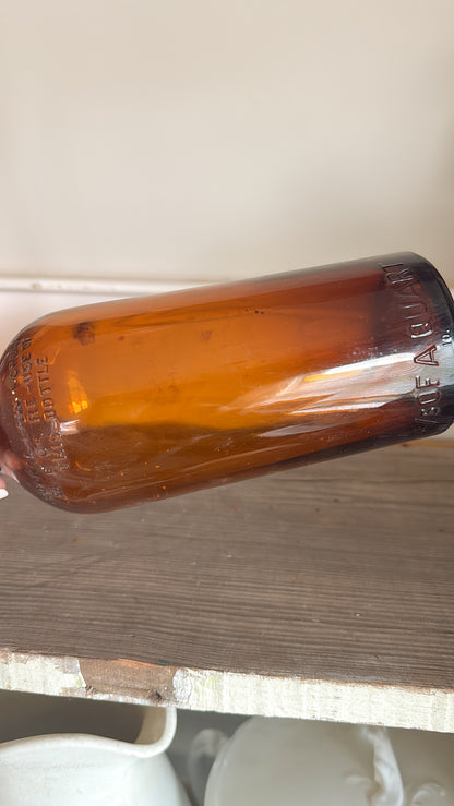 11”T Glass Amber Bottle